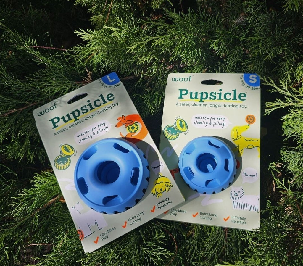 Durable Woof Pupsicle dog treat toy made from non-toxic, BPA-free natural rubber. Perfect for frozen and soft treats like peanut butter, yogurt, and bone broth. Mess-free, dishwasher-safe, and designed for long-lasting enrichment. Ideal slow feeder and interactive toy for dogs.