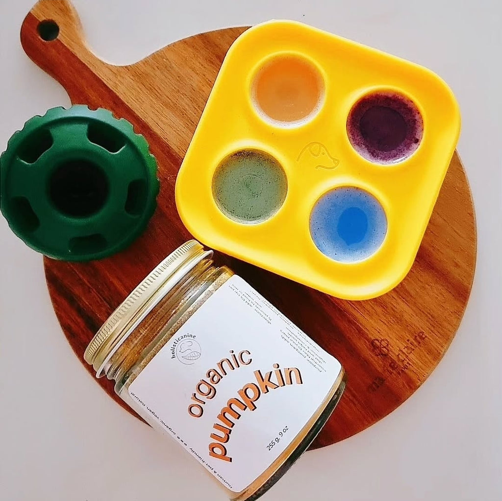 Durable Woof Pupsicle dog treat toy made from non-toxic, BPA-free natural rubber. Perfect for frozen and soft treats like peanut butter, yogurt, and bone broth. Mess-free, dishwasher-safe, and designed for long-lasting enrichment. Ideal slow feeder and interactive toy for dogs.