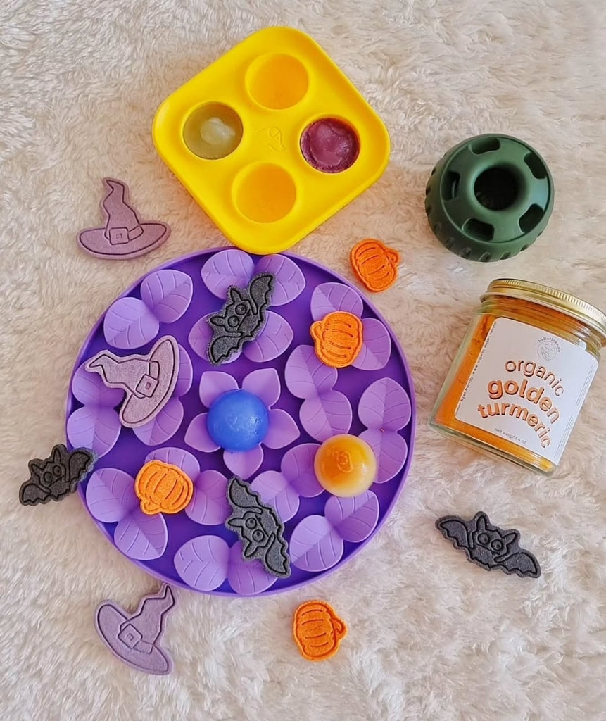 Durable Woof Pupsicle dog treat toy made from non-toxic, BPA-free natural rubber. Perfect for frozen and soft treats like peanut butter, yogurt, and bone broth. Mess-free, dishwasher-safe, and designed for long-lasting enrichment. Ideal slow feeder and interactive toy for dogs.